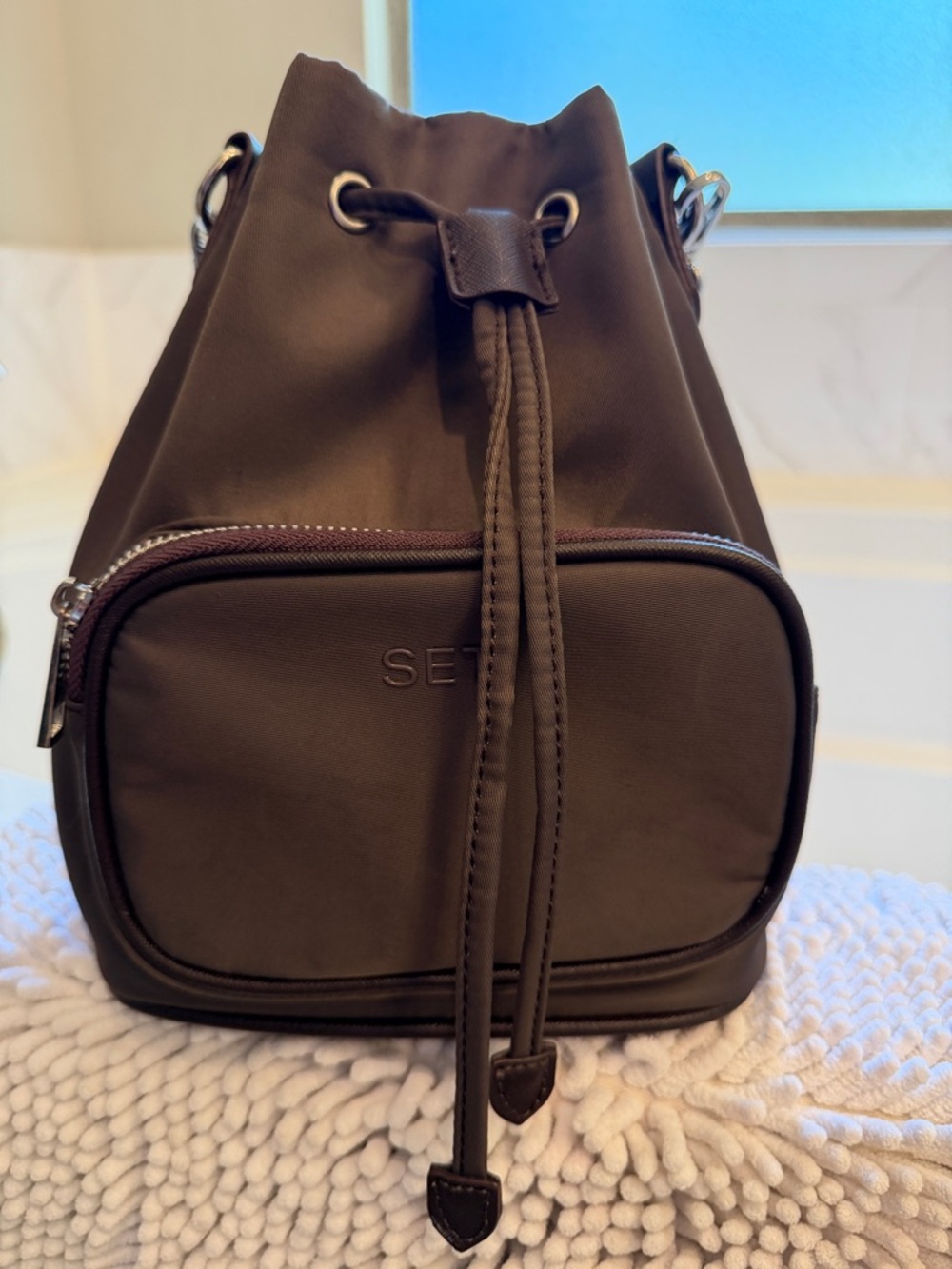 Set Active Bucket Drawstring Crossbody Bag in Dark Brown